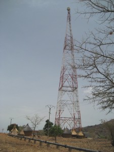 Cell tower & huts - Far North, Cameroon