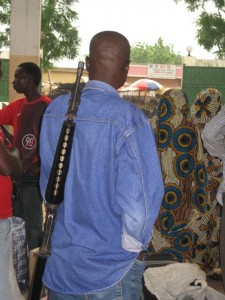 Dude with gun - Bus station, Maroua, Cameroon