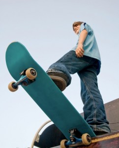 Teenage boy on skateboard